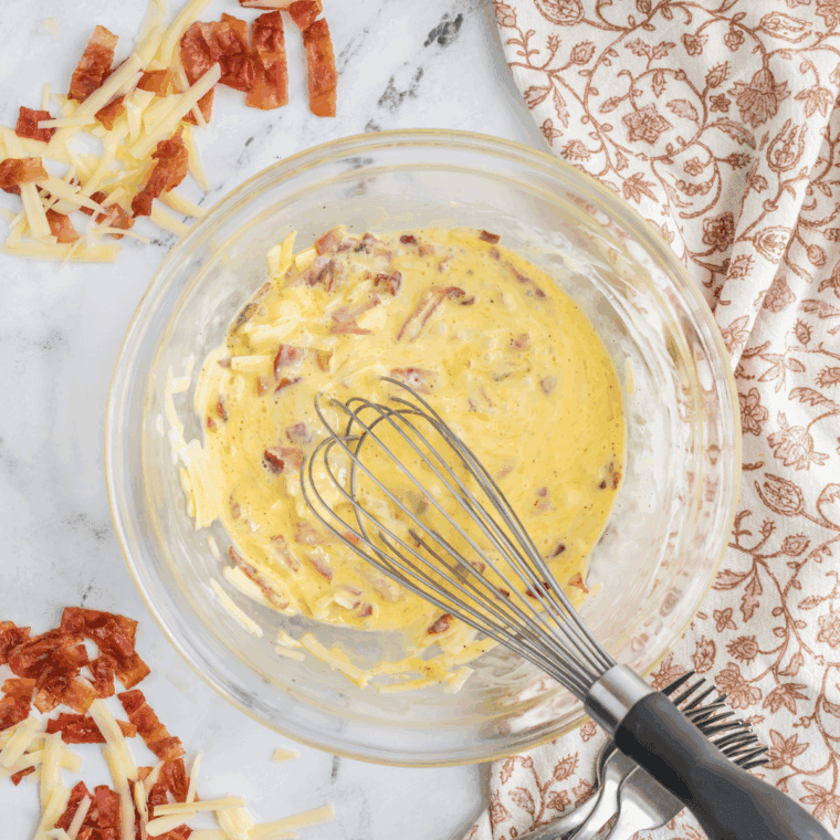 Whisk the egg mixture in a large mixing bowl.
