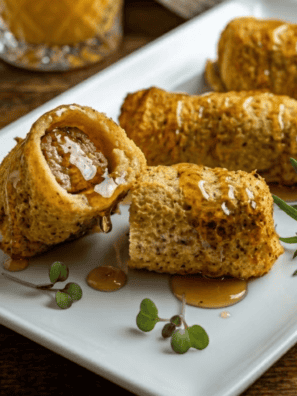 Air fryer French toast and sausage roll-ups are the breakfast that finally settles the sweet-versus-savory argument. A juicy breakfast sausage gets wrapped in soft bread, dipped in a cinnamon-vanilla egg batter, and air-fried until the outside is golden and crisp and the inside stays custardy &mdash; French toast and sausage in one dippable, handheld bite.