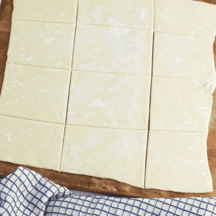 Ingredients needed for Air Fryer Puff Pastry Donuts on kitchen table.