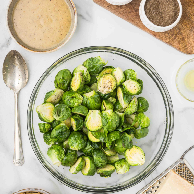 Ingredients Needed For Air Fryer Lemon Pepper Brussels Sprouts on table.