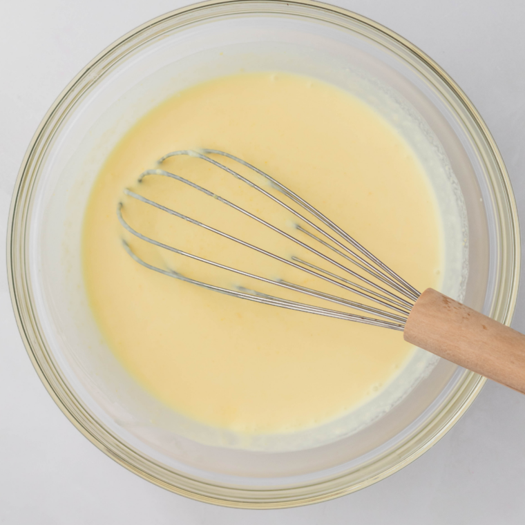 Lemon yogurt, eggs, zest, and oil mixed into the dry ingredients