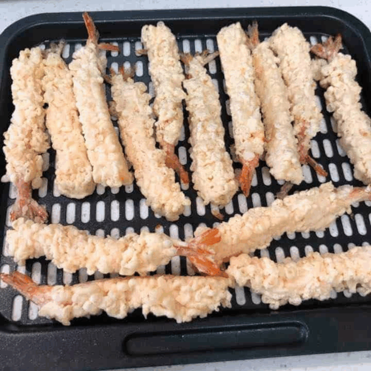 Battered Benihana Tempura Shrimp Copycat Recipe on air fryer tray.