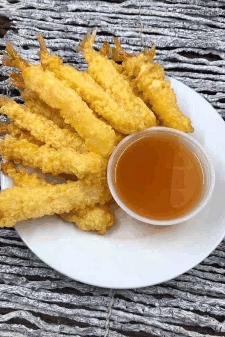 Golden crispy tempura shrimp served with dipping sauce, homemade Benihana-style.