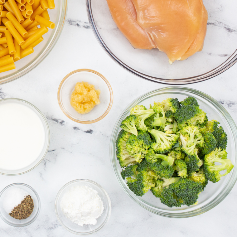 Ingredients needed for Air Fryer Broccoli Parmesan on kitchen table.