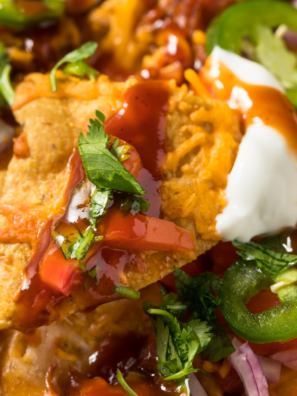 Close up of a plate of Air Fryer Loaded Pulled Pork Nachos