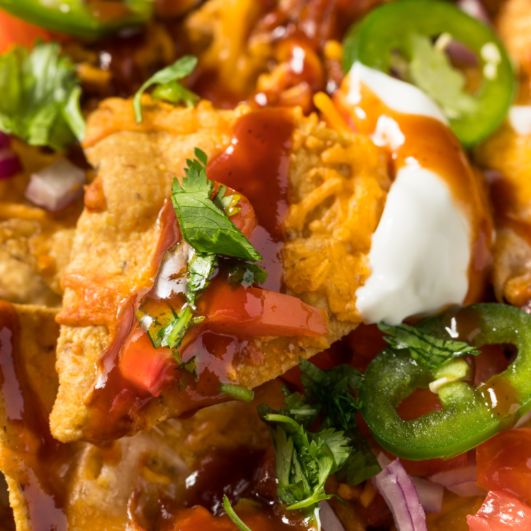 Close up of a plate of Air Fryer Loaded Pulled Pork Nachos