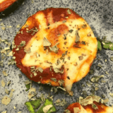 Air Fryer Zucchini Pizza Bites are a low-carb, cheesy snack or appetizer made with fresh zucchini, marinara sauce, and melted mozzarella—perfect for quick, healthy cravings!