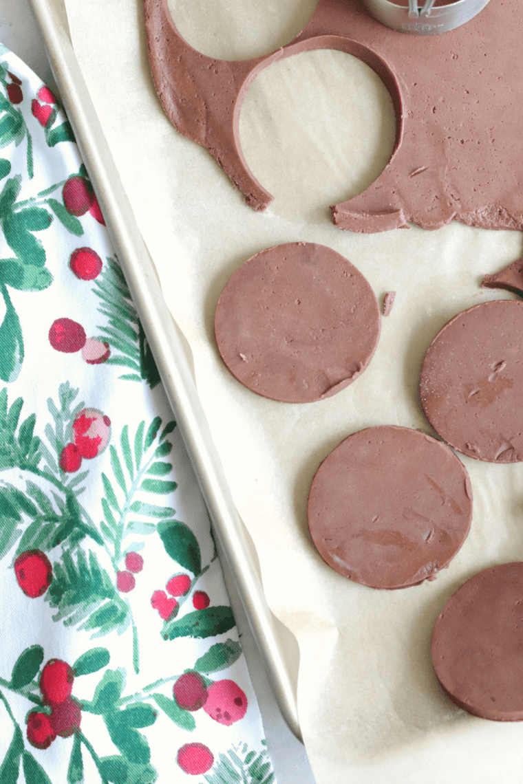 Dough portioned into roughly 1-inch balls on a surface.