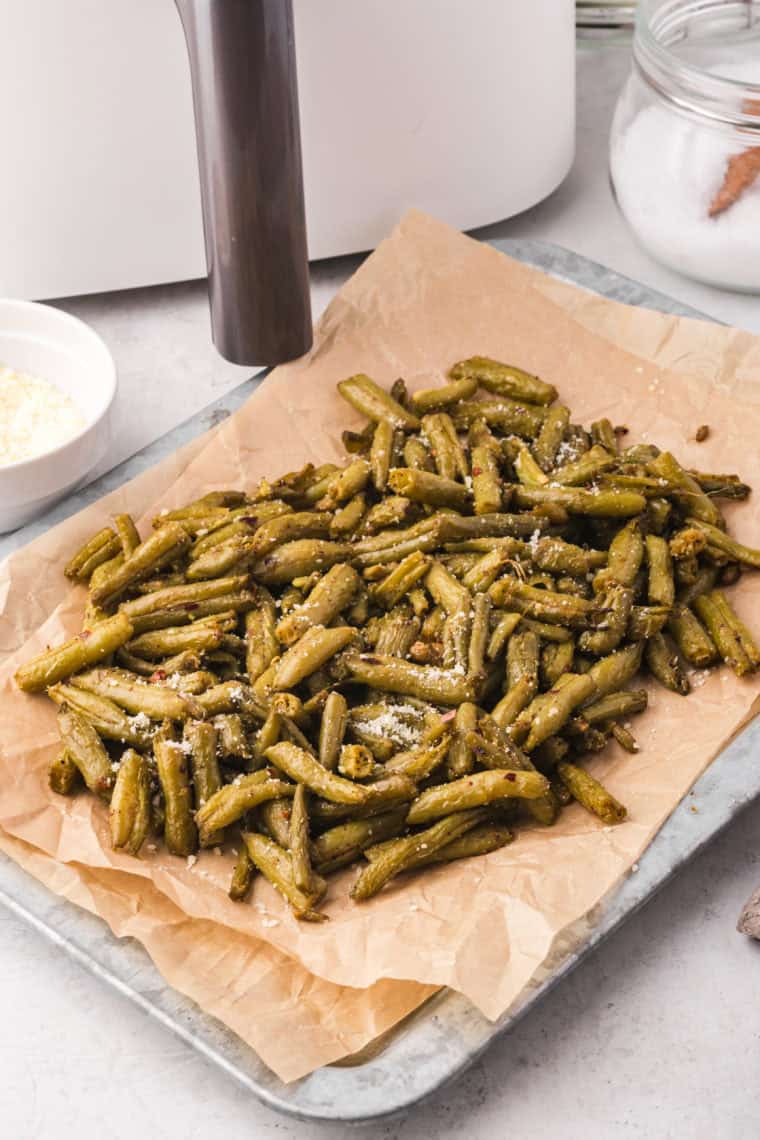 Crispy, golden air fryer canned green beans seasoned with garlic and Parmesan.