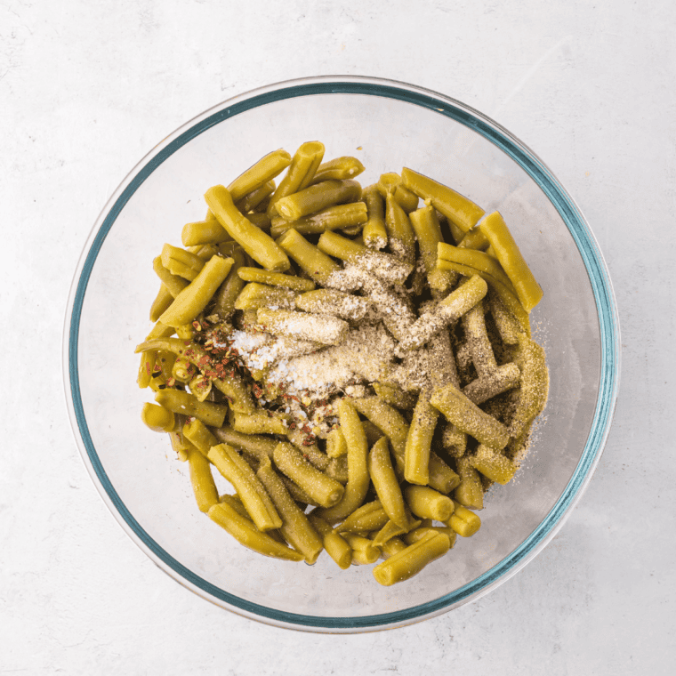 Drain and pat dry canned green beans to remove excess moisture for crispiness.