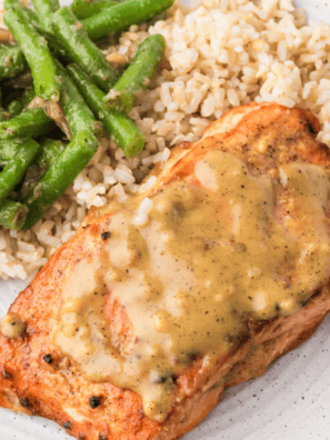 Perfectly cooked Air Fryer Frozen Salmon fillets with crispy edges."