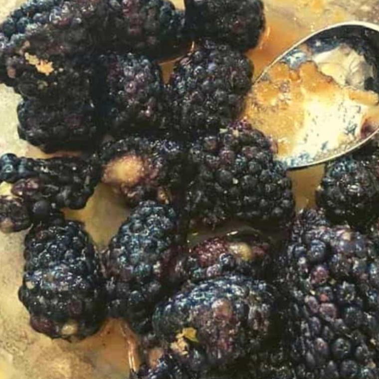 Prepare the filling, mixing the blackberries with the other ingredients in a large bowl.