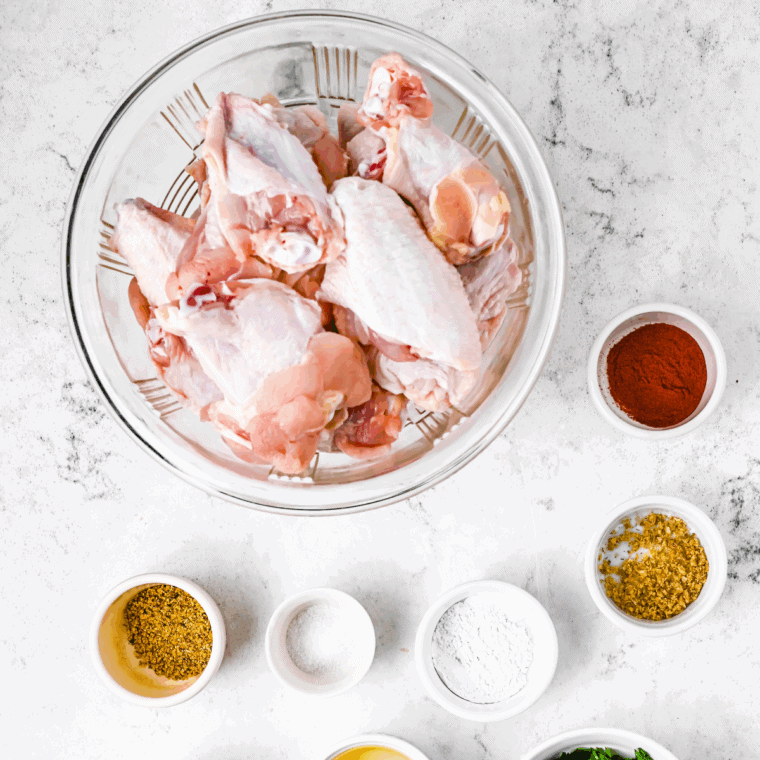 Ingredients needed for Air Fryer Salt And Vinegar Wings on kitchen table.