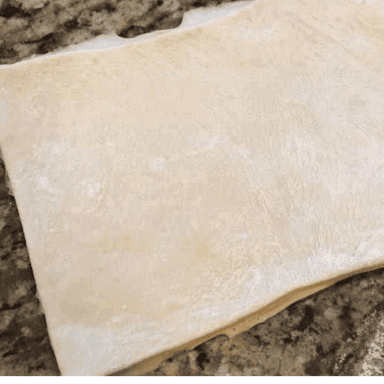 Cut the bread dough into a square.