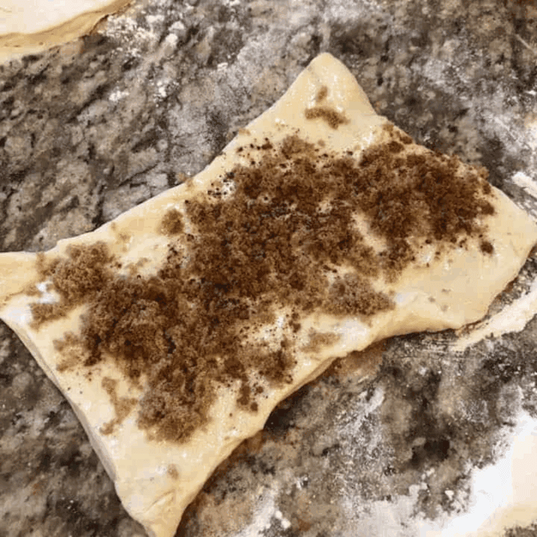 Add the toppings onto the prepared bread dough.