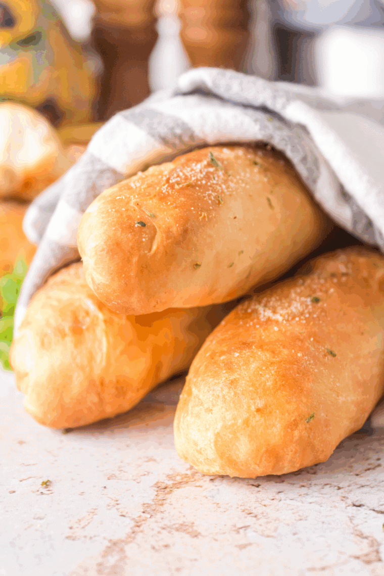 Golden, soft, and buttery homemade Captain D’s-style breadsticks served on a plate.