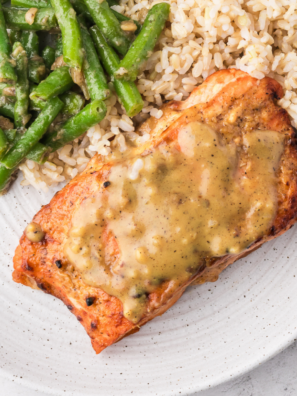 Air fryer frozen salmon cooked without thawing resulting in flaky tender fish with crisp edges ready in 16 minutes for quick easy dinner