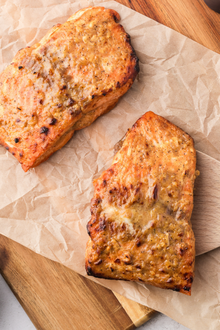 Air fryer frozen salmon cooked straight from frozen with flaky tender inside and lightly crisp edges ready in 16 minutes for a quick simple meal