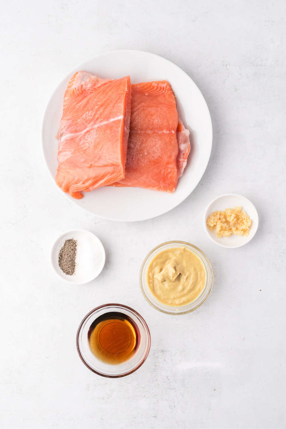 Ingredients needed for Frozen Salmon in the Air Fryer &mdash; No Thawing, Flaky & Tender in 16 Minutes on kitchen table.