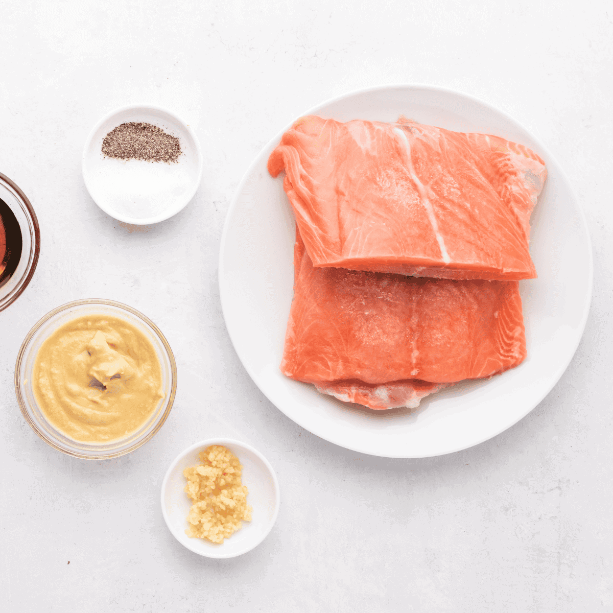 Ingredients you will need for making frozen salmon in the air fryer.