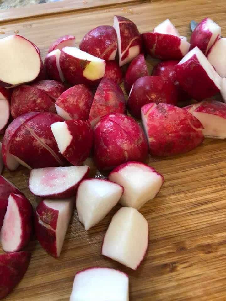 Cut the radishes into 1-inch pieces using a sharp knife.