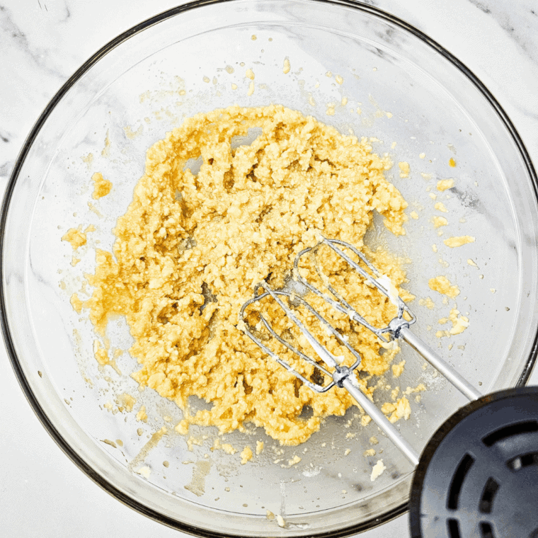 In a large mixing bowl, beat together butter, granulated sugar, brown sugar, egg, and vanilla until creamy and smooth. Mix in flour, salt, and baking powder, then add milk and beat until smooth batter forms.