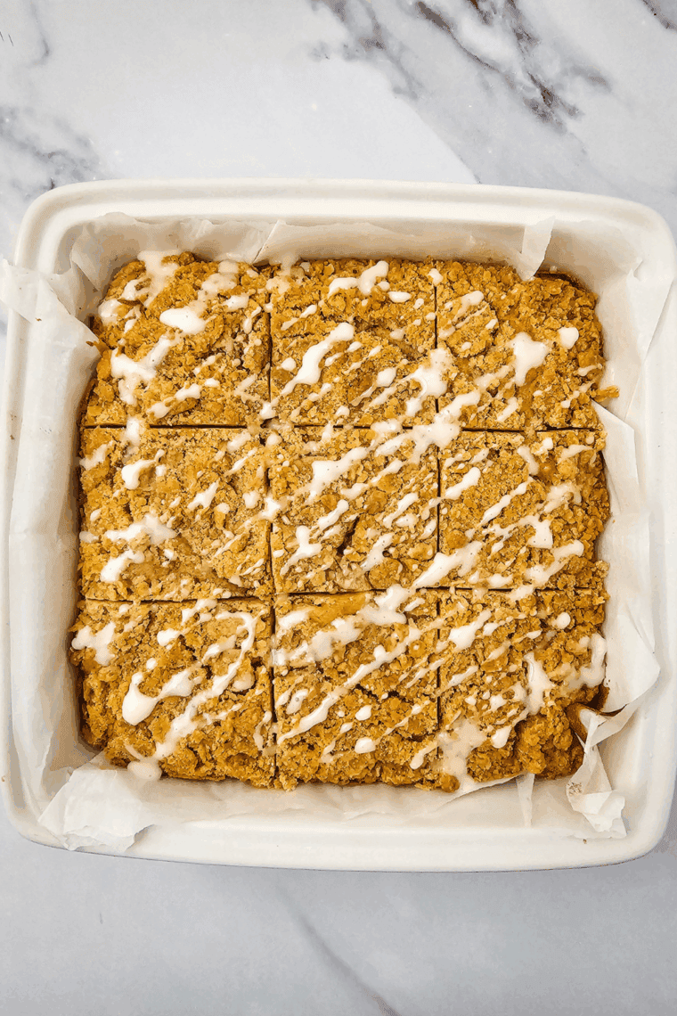 Cooked Apple Coffee Cake with glaze on top.