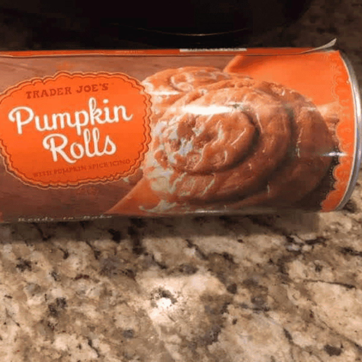 Ingredients needed for Air Fryer Canned Pumpkin Cinnamon Rolls on kitchen table.