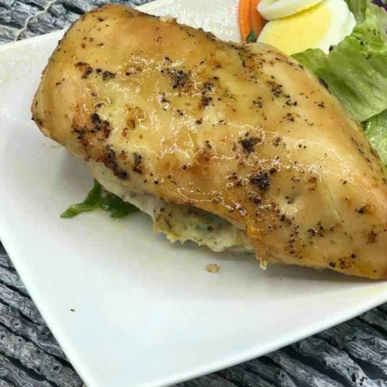 "Delicious cream cheese stuffed chicken breast filled with spinach and herbs."