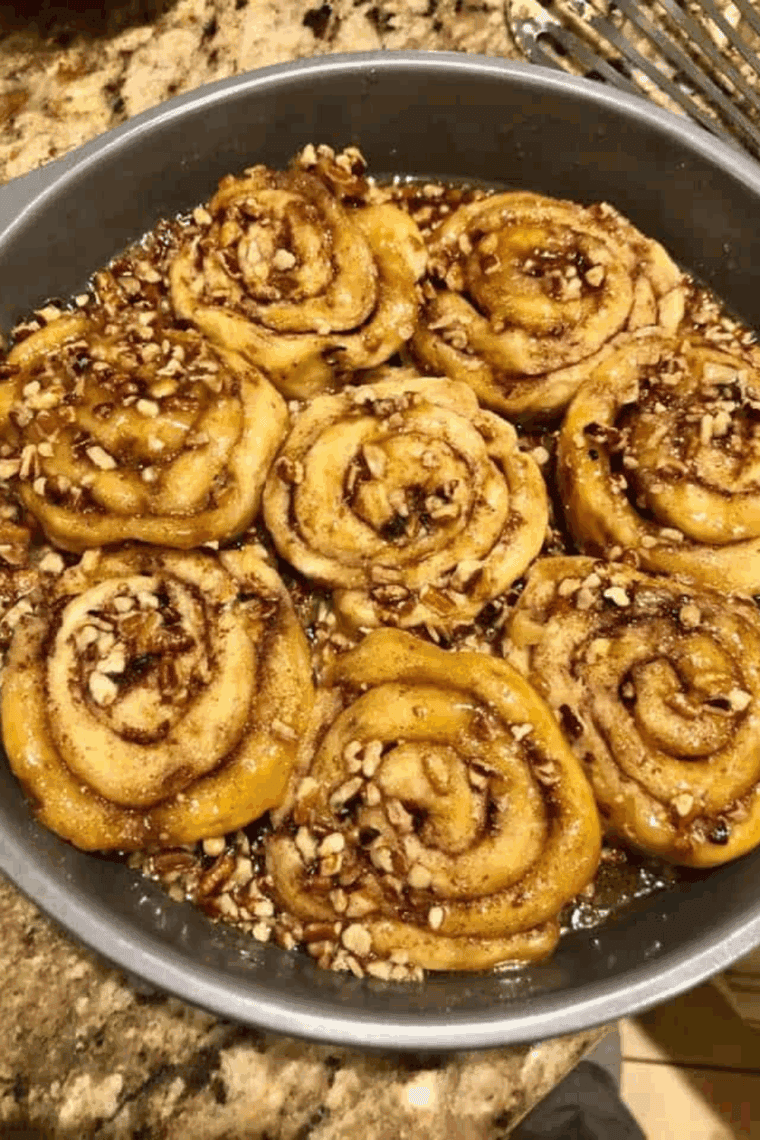 Copycat Cracker Barrel Buter Pecan Sticky Buns plate on counter.
