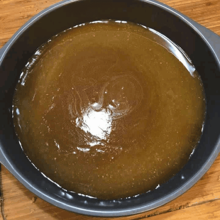 Add the topping to the bottom of the baking pan.