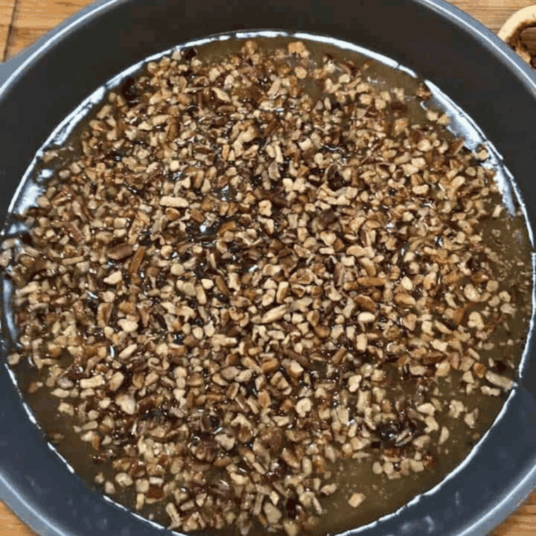 Place the pecans on the bottom of the plate, mixing in with the topping.