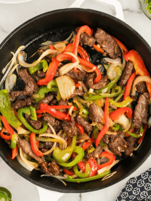 Bowl of easy soy-free stir fry sauce ready to pour over vegetables and protein.