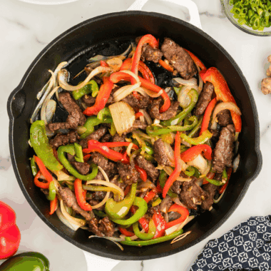 Bowl of easy soy-free stir fry sauce ready to pour over vegetables and protein.