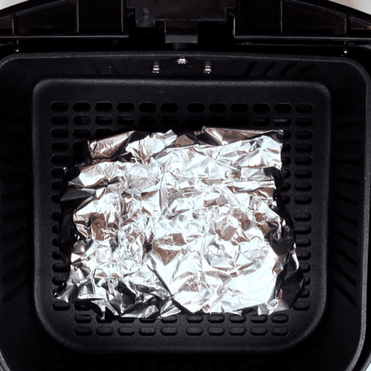 Place Cheesy Potatoes Foil Packet into the air fryer