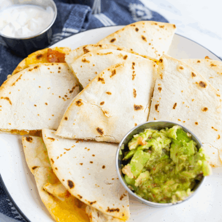 Plate of crispy, cheesy Air Fryer Chicken Quesadillas
