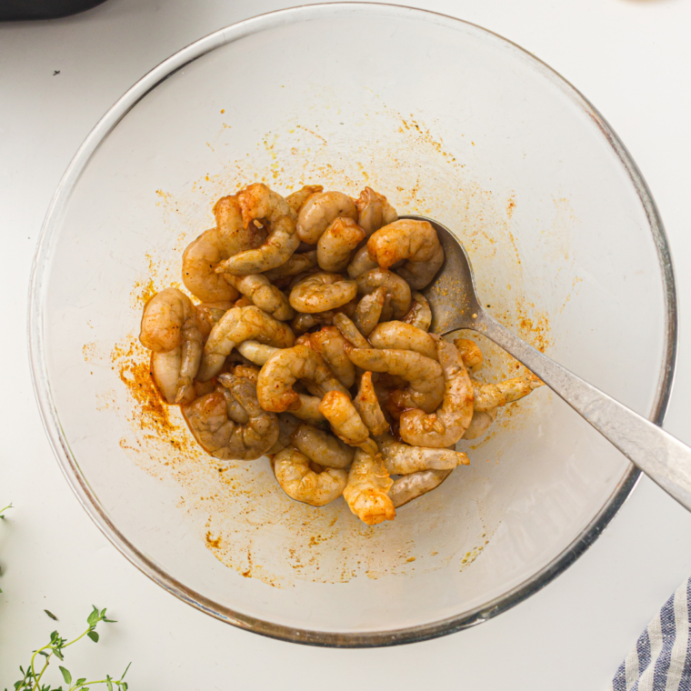 Shrimp tossed with olive oil, garlic, lemon juice, lemon zest, salt, and black pepper.