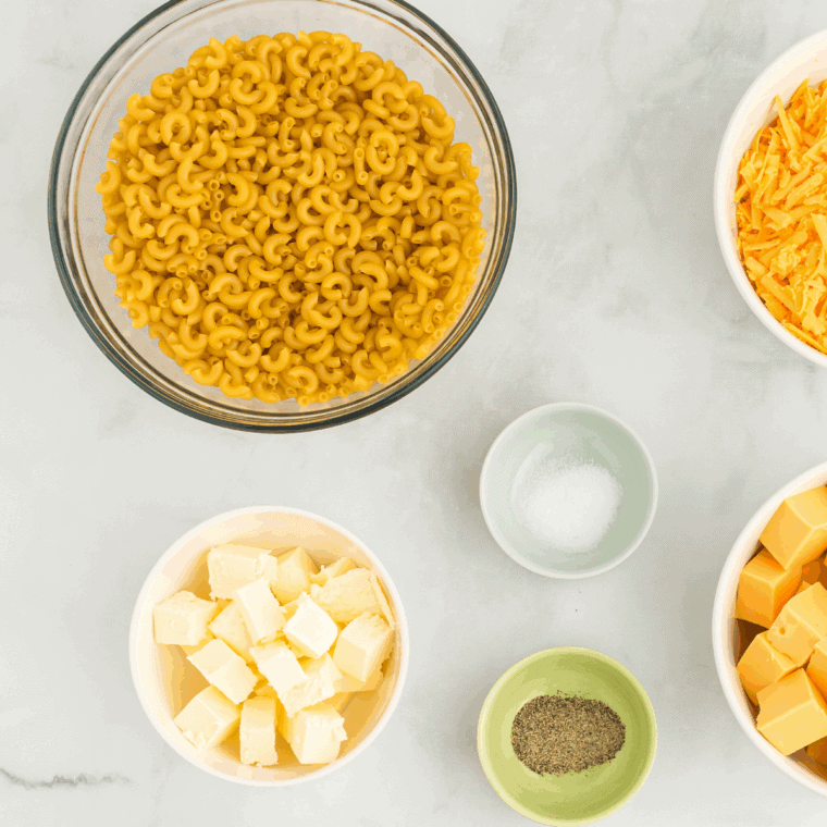 Ingredients needed for Instant Pot Copycat Kraft Mac and Cheese on kitchen table.