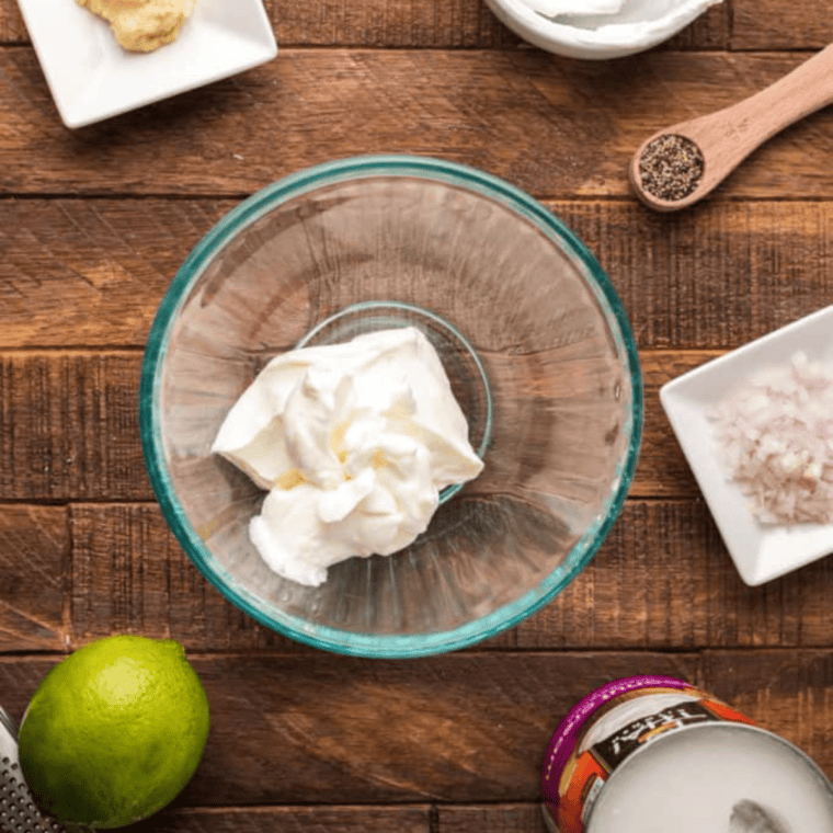 Ingredients needed for Red Lobster Tartar Sauce Copycat Recipe on kitchen table.