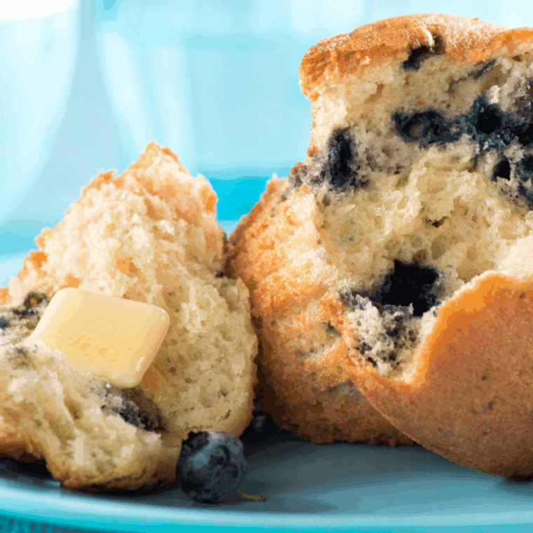 Selection of the best air fryer muffin pans including silicone and nonstick options, arranged on a kitchen counter next to an air fryer.
