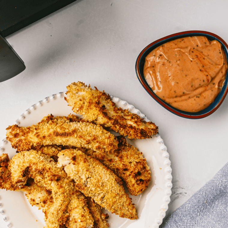 Covered Zaxbys sauce in the refrigerator ready to serve with chicken fingers or fries