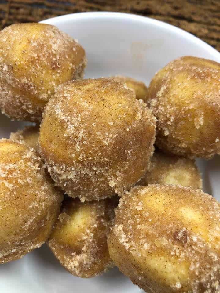 Is there anything better than fresh, warm donuts? These cinnamon sugar donut holes are quick and easy to make in your air fryer, and they're SO delicious! You'll love how crispy they are on the outside and fluffy on the inside. Plus, they're perfect for a sweet treat any time of day!