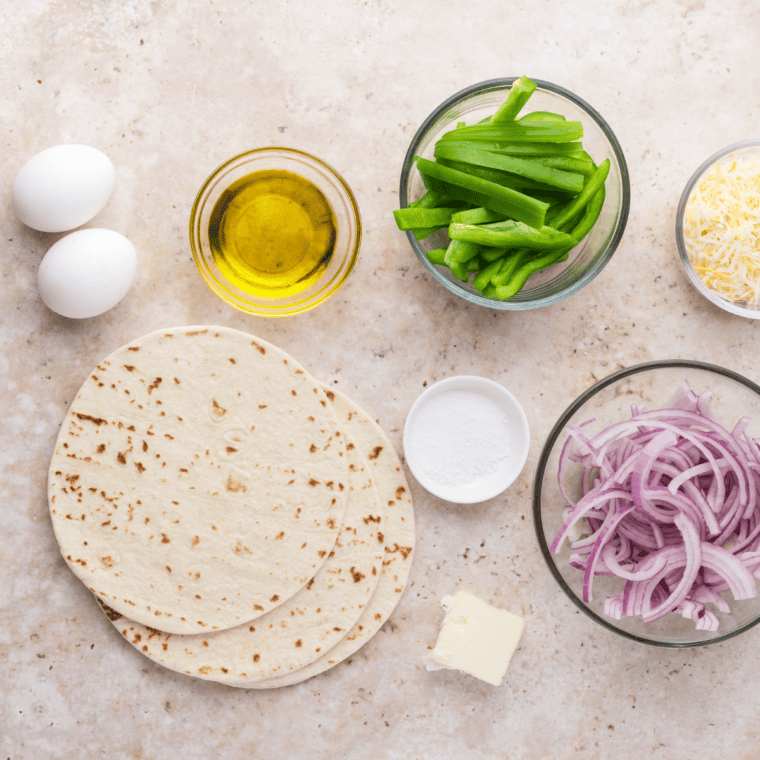 Ingredients needed for Air Fryer Breakfast Tacos on kitchen table.