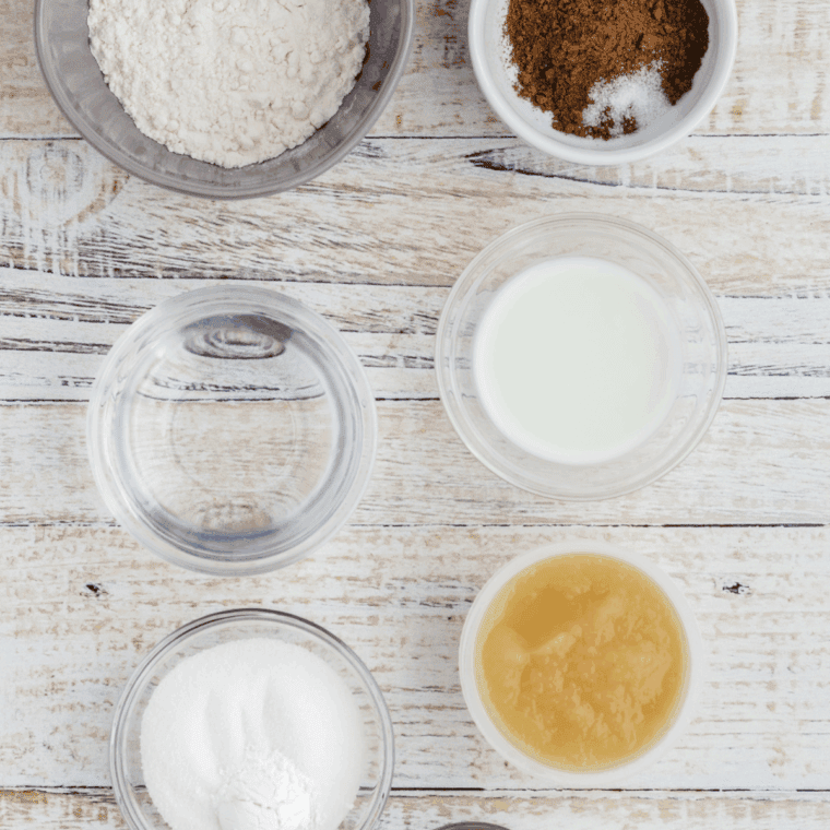 Ingredients needed for Air Fryer Cinnamon Sugar Donut Muffins on kitchen table.