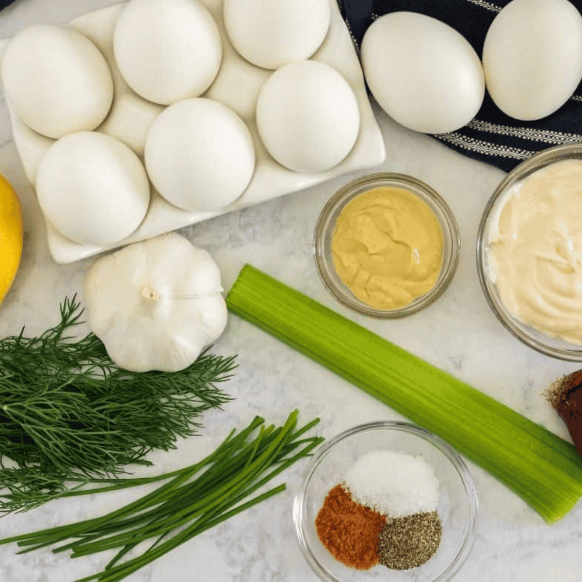 Ingredients needed for Air Fryer Egg Salad on kitchen table.