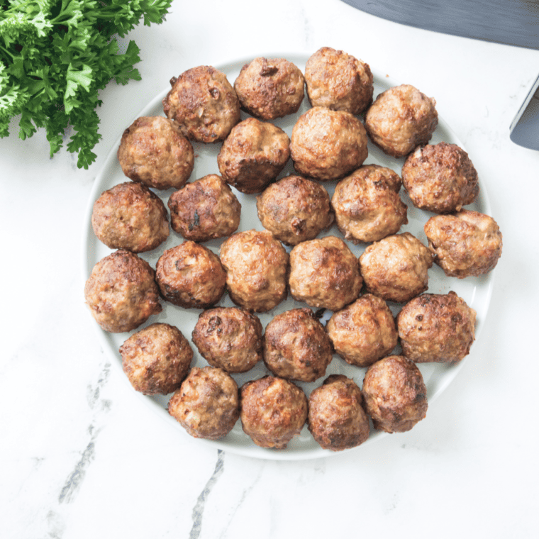 Ingredients needed for Air Fryer Honey Garlic Meatballs on kitchen table.