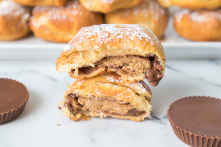 Air fryer dough wrapped Reese&rsquo;s peanut butter cups cooked until golden brown with soft gooey melted chocolate center for a quick dessert