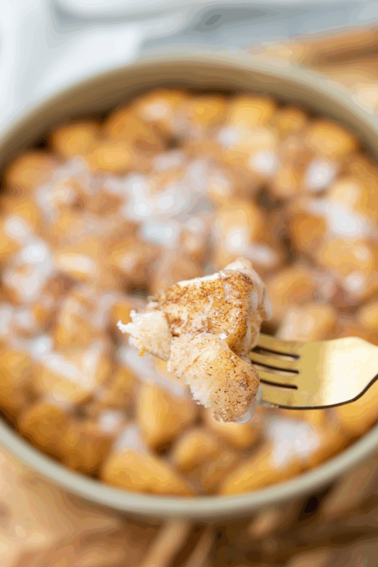 Single serve monkey bread in a ramekin, golden, sticky, and pull-apart