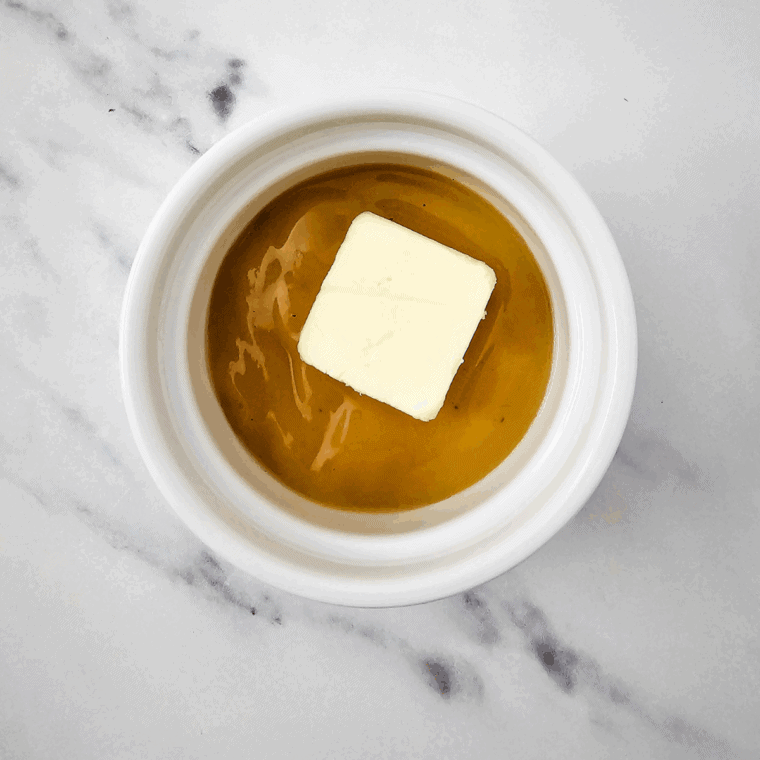 Melted butter and gravy poured over stuffing mixture and stirred.