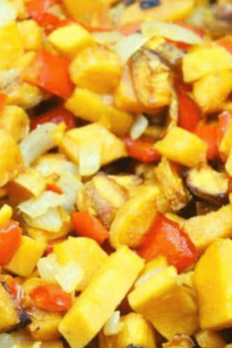Air fryer sweet potato hash cooked with onions and peppers until golden and crisp for quick healthy breakfast bowl or side